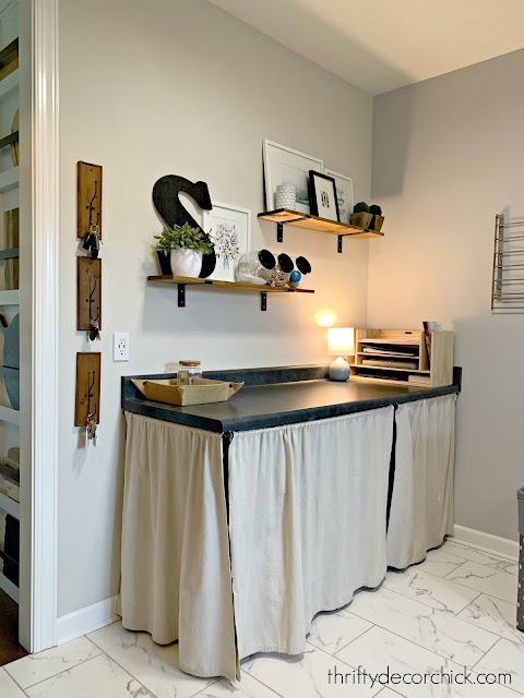 Laundry folding table with hidden kitty litter