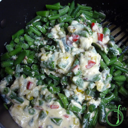 Morsels of Life - Cheesy Green Bean Casserole Step 11 - Stir in green beans.