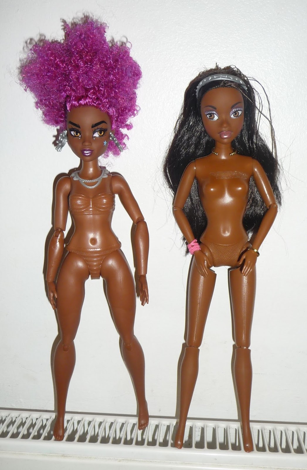The hips compared to a modern Barbie body shows a narrower chest and broade...