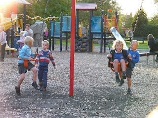 pushing older children in the baby swings