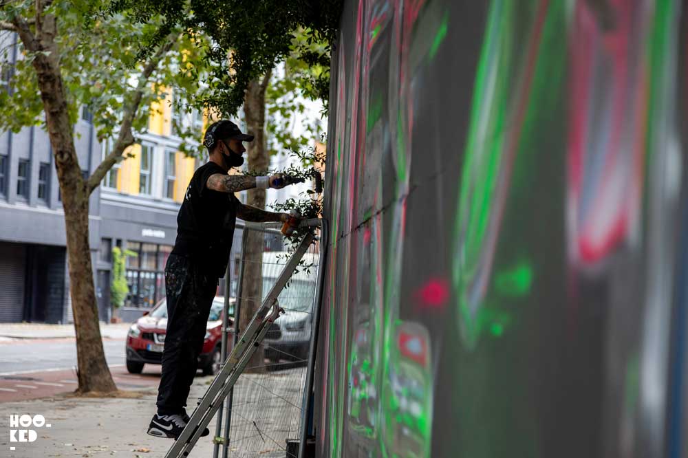 Street artist Artist Fanakapan's Rise And Shine Mural in Old Street, London