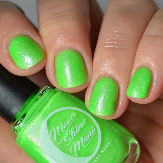 neon green nail polish with shimmer swatch