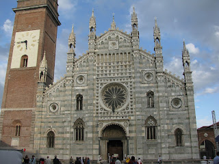 The black and white marble facade of the Duomo in Monza