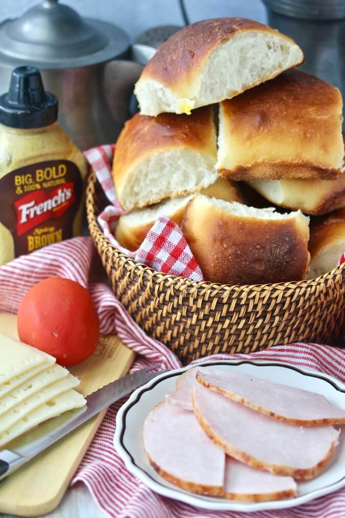 Sourdough Sandwich Rolls in a basket with picnic ingredients