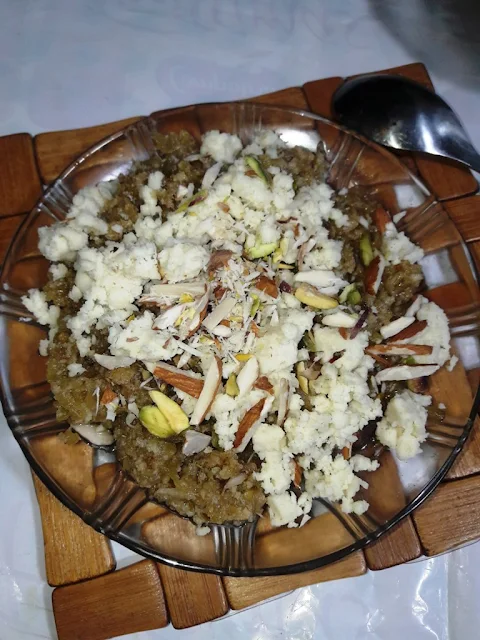 transfer-to-the-serving-plate-and-garnish-with-khoya-and-nuts