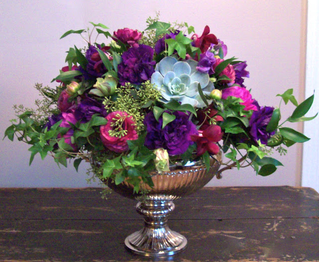 michigan wedding florist, centerpiece, secret garden, english garden, silver urn vase, silver pedestal vase, elegant guest table arrangement, sweet pea floral design, holly rutt, purple, succulent, lisianthus, ranunculus, sweet pea, bride, country club