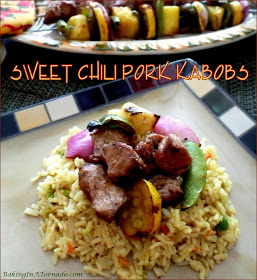 Sweet Chili Pork Kabobs: pork tenderloin, vegetables and pineapple chunks marinated, skewered and grilled. | Recipe developed by www.BakingInATornado.com | #recipe #dinner