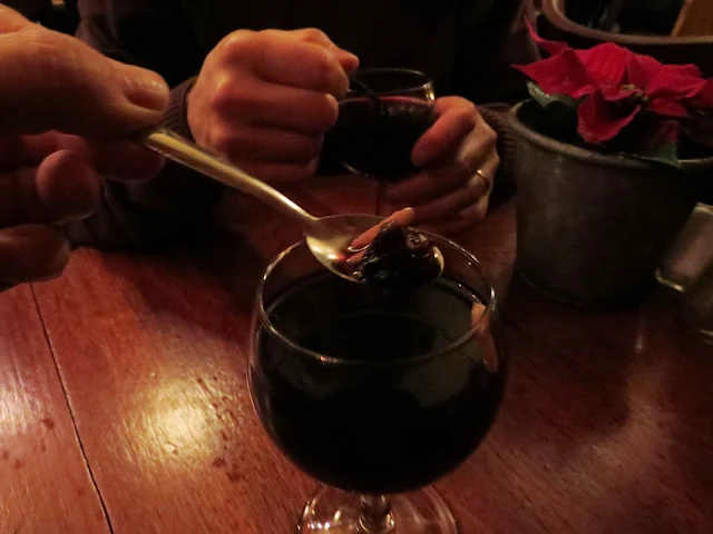 Raisins and almond slivers in glogg at the Copenhagen Christmas Markets