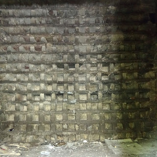 Pigeonholes inside the doocot for the birds to nest in.  Photograph by Kevin Nosferatu for The Skulferatu Project.