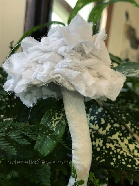Frilly white mushroom fabric sculpture for fairy tale loves and fungus foragers! #fabricmushroom #mushroom #enchantedforest #woodlandmagic #aliceinwonderland #fairytale #fabrictoadstool 