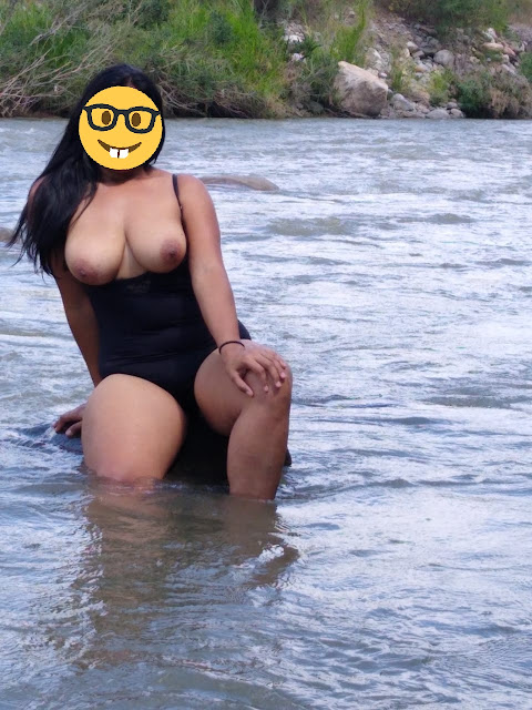 Desnudandose en el rio