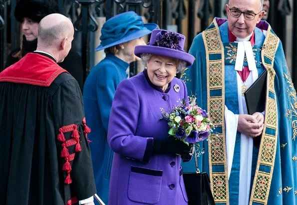 Meghan Markle wore Victoria Beckham printed crepe long sleeve midi dress, Kate Middleton wore a red coat by Catherine Walker