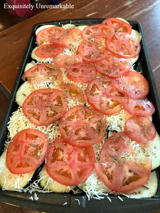 Sliced Eggplant Dish with cheese tomatoes eggplant on a try