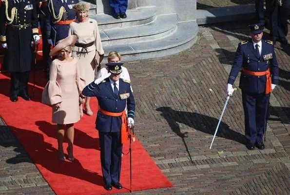 Queen Maxima wore NATAN Crepe effect dress with ruffled sleeves. King Willem-Alexander presents Military William Order