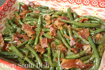 Fresh green beans, blanched, tossed with bacon and onion, then baked in a brown sugar glaze.