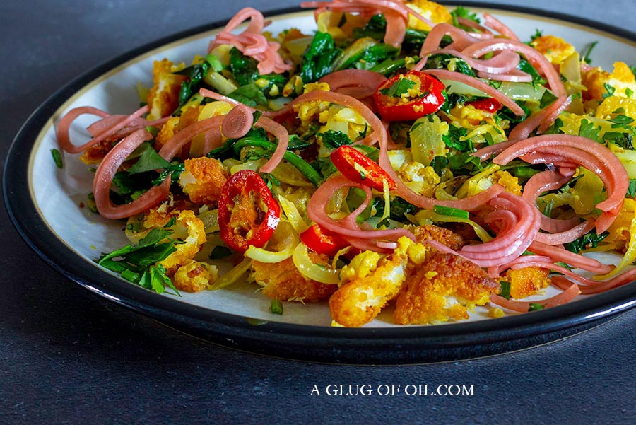 Fish Finger Bhorta. Fish Finger Bhorta. A coulouful dish of fish fingers with red onion, chillies and spinach.