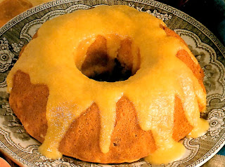 A classic peach-flavoured sponge pudding baked in a ring mould served topped with a peach sauce