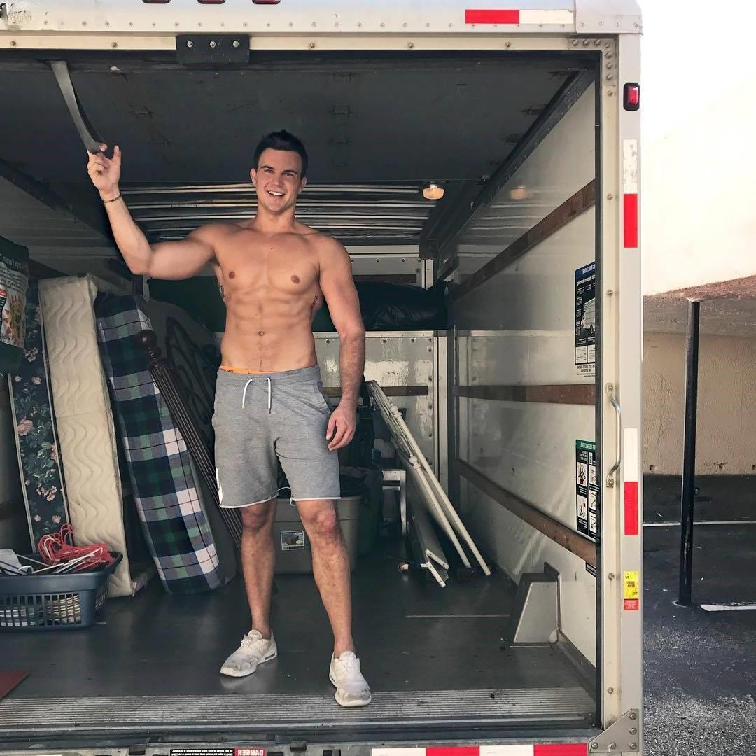 young-fit-shirtless-abs-smiling-dude-movers-truck-working-hard