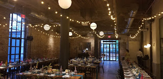 String Lights suspended in Parallel Lines with Mirror Ball at The Wythe Hotel