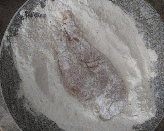 chicken dredged in gluten free flour mixed with spices
