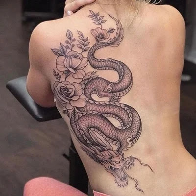dragon tattoo on thigh