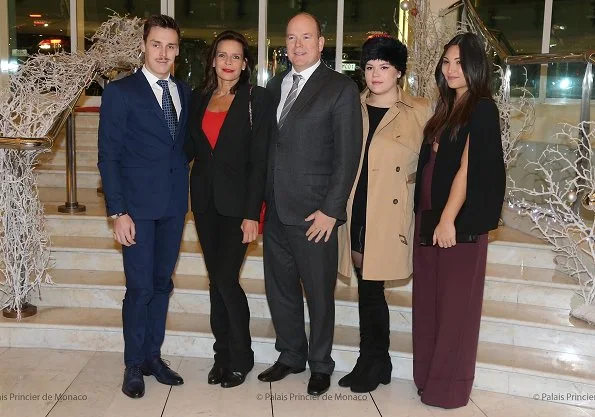 Princess Stephanie, Prince Albert, Camille Gottlieb and Louis Ducruet. Stephanie wore Chanel pantsuit and red top