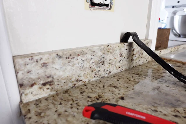 removing granite on wall