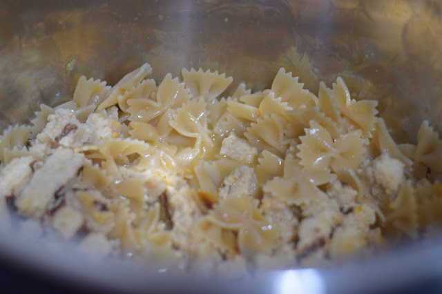 The fully cooked pasta and chicken in the instant pot.