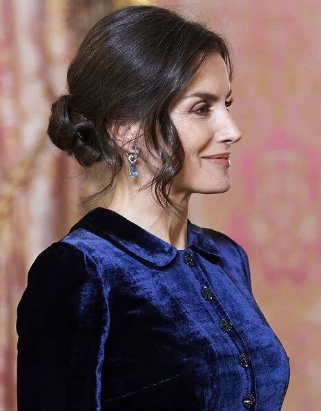 Queen Letizia wore a blue velvet gown by Spanish fashion house Felipe Varela, which she prefers to wear at these kind of events. aquamarine earrings