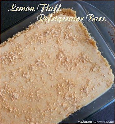 Lemon Fluff Refrigerator Bars (with a lower fat option) are a sweet, citrusy summer dessert. | Recipe developed by www.BakingInATornado.com | #recipe #dessert