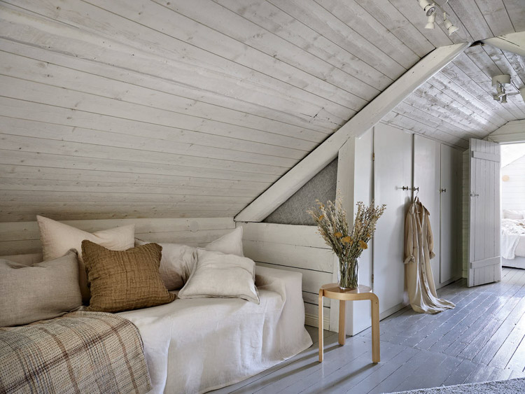 An Idyllic Blue and White Swedish Cottage In The Countryside