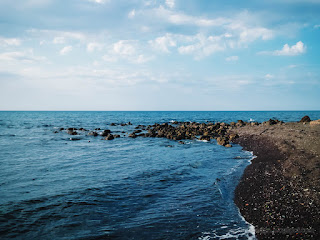 Countryside Tropical Rocky Beach Scenery In The Cloudy Sky In The Afternoon At Umeanyar Village North Bali Indonesia