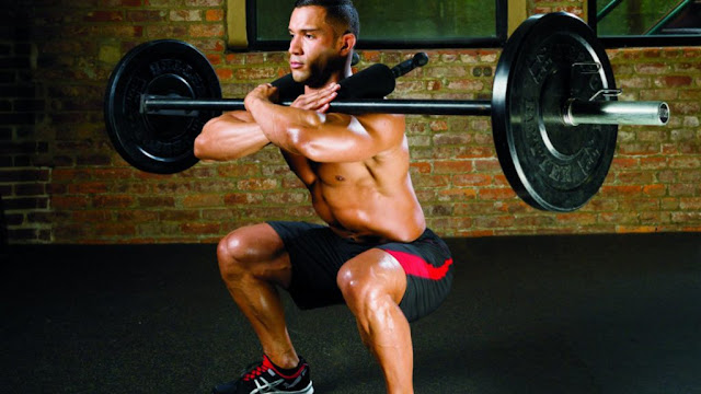 Muscle strengthening: four benefits and five useful home exercises Squat with barbell placed in front of chest