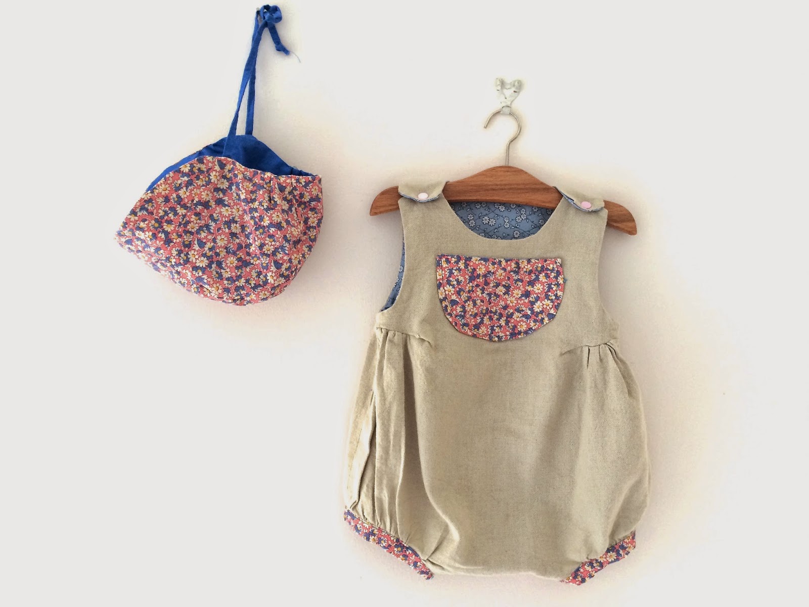 Super cute baby romper and matching bonnet.