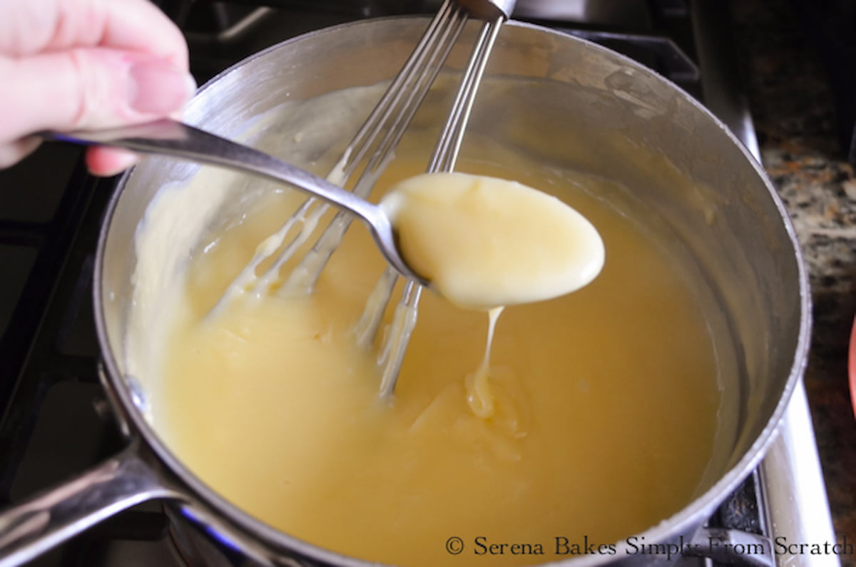 Lemon Pudding in a large stainless steel pan.