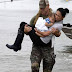 #HurricaneHarvey: Photo of mother and baby's rescue becomes symbol of storm