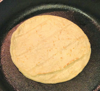 Corn Tortilla in Cast Iron Skillet for Buttermilk-Marinated Calamari Tacos with Jicama-Cabbage Slaw and Chipotle-Honey Aioli