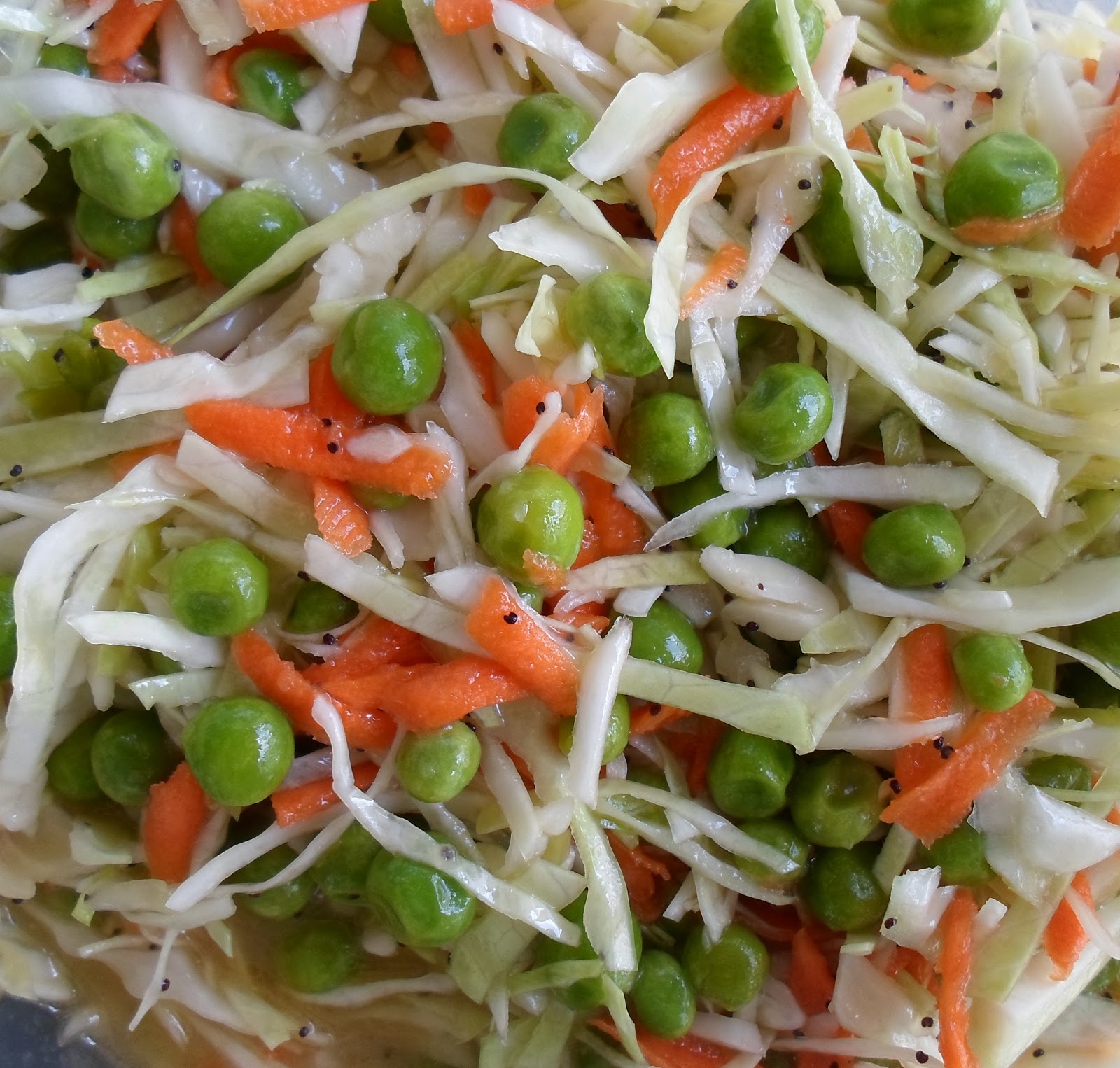 Happier Than A Pig In Mud Coleslaw with Peas and Poppy Seed Dressing