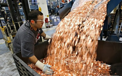 Samsung pays Apple $1 Billion sending 30 trucks full of 5 cent coins