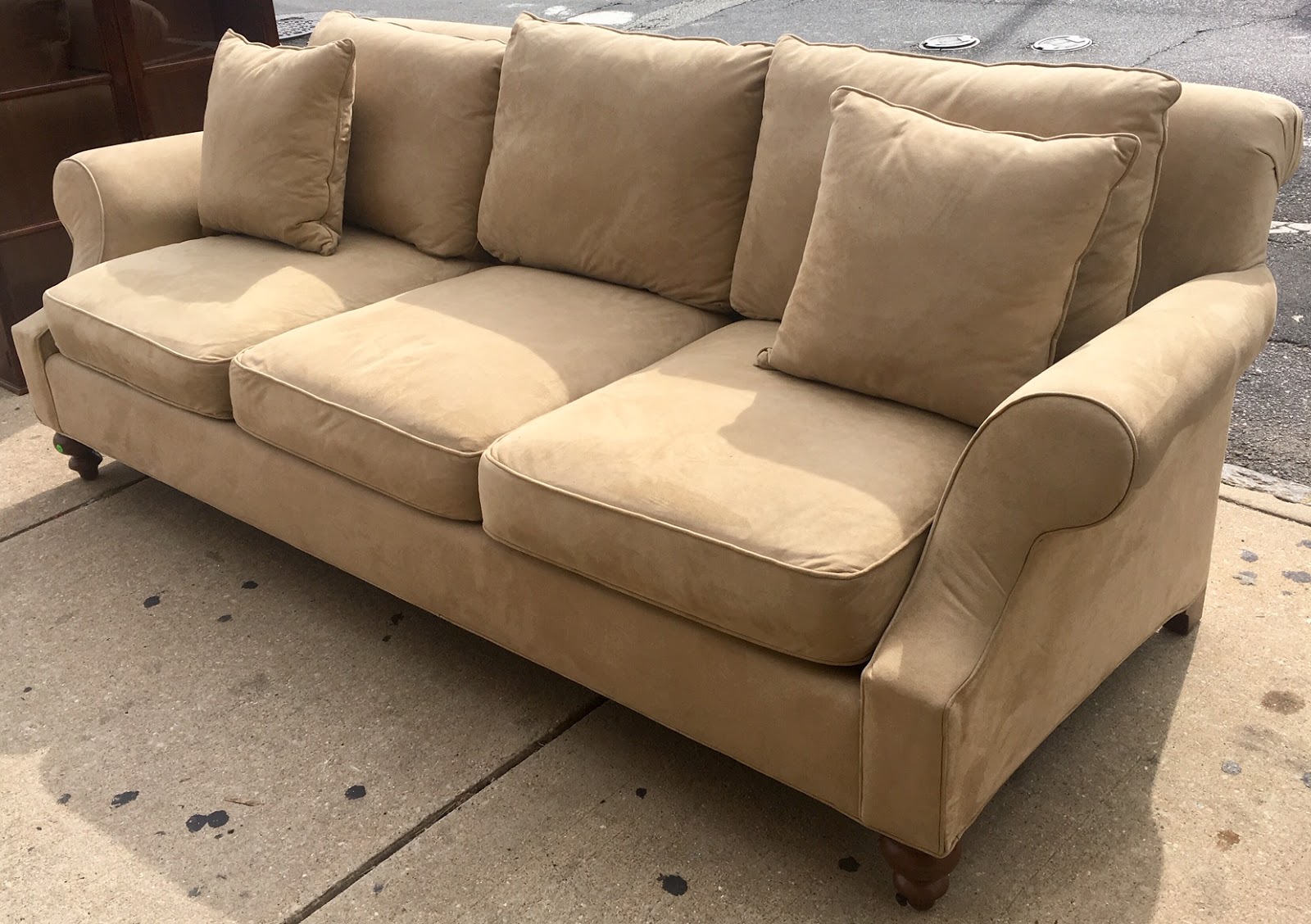 beige microfiber and faux leather sofa