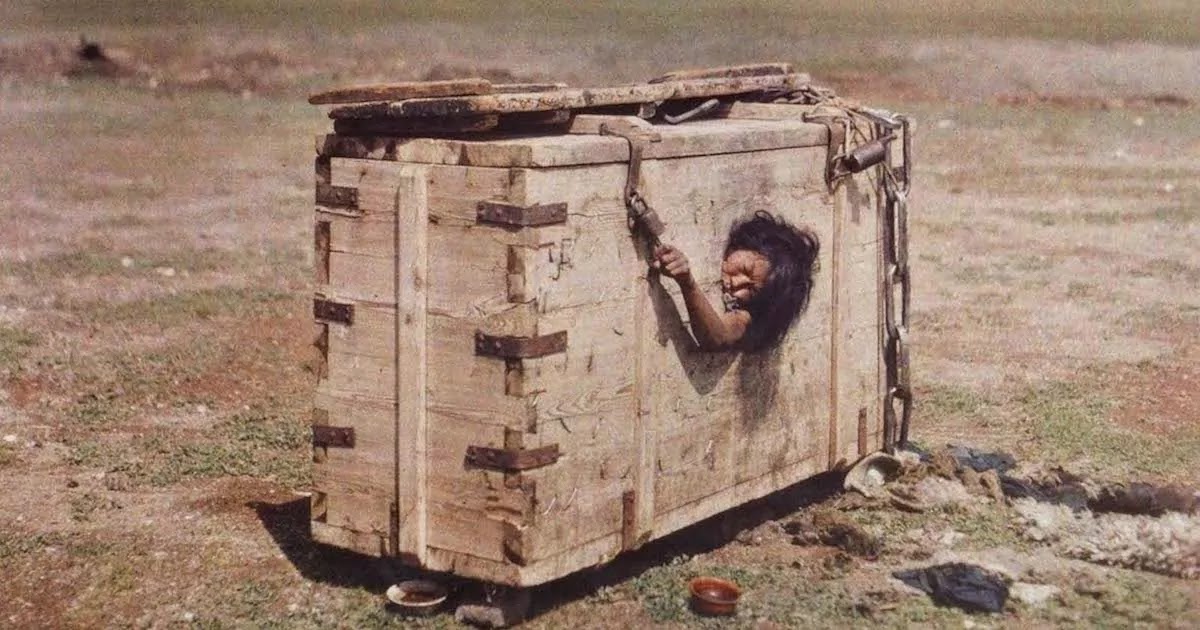 Shocking Photograph From 1913 Shows A Mongolian Woman Reaching Out From Her Crate Prison