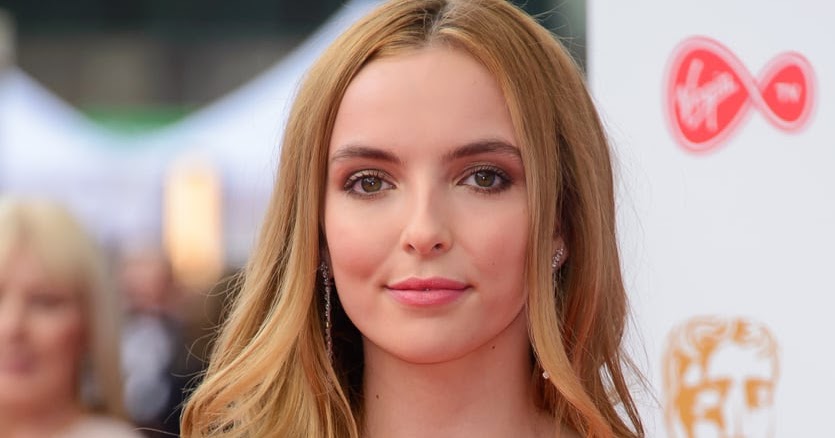 Jodie Comer Braless in Red Gown