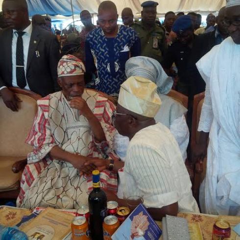 Photos: Fayose kneels publicly before a former Ondo state governor