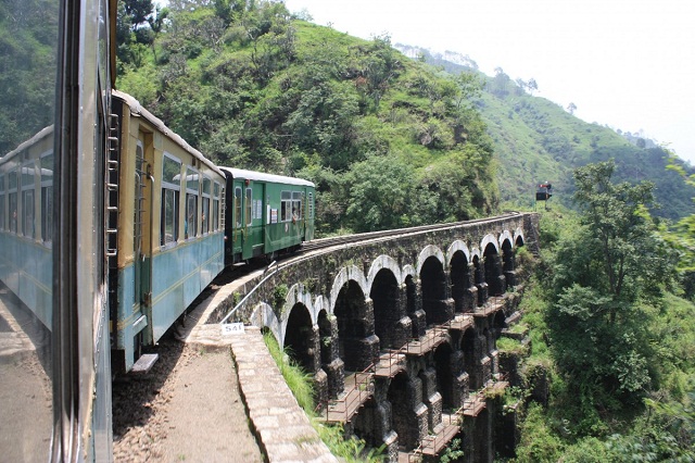 train crossing the bridge on Kalka Shimla Railway line