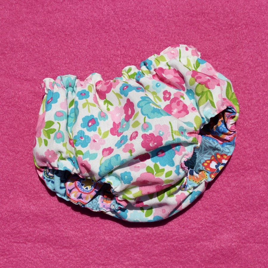 Cubrepañal reversible