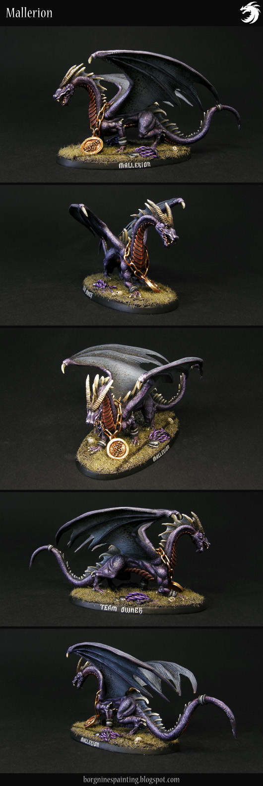 Picture showing a dragon tabletop miniature, a Shadow Dragon from Reaper - with purple scales, reddish underbelly and dark blue wing membranes, standing on an oval base. The dragon has a golden medallion on its neck, bearing the Blood Bowl logo. The miniature is used as a team owner for a Blood Bowl Dark Elf team.