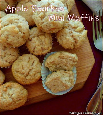 Apple Bourbon Mini Muffins are juice and apple bourbon flavored pop in your mouth bites studded with fresh apple and chopped walnuts. | Recipe developed by www.BakingInATornado.com | #bake #apple