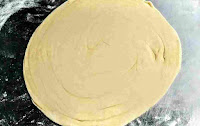 Rolled wheat parotta dough in round shape