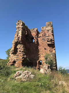 A picture showing the ruins of Seafield Tower from an angle that shows two of the outside walls have now gone leaving a clear view into the ruins of the interior of the tower.  Photo by Kevin Nosferatu for the Skulferatu Project.