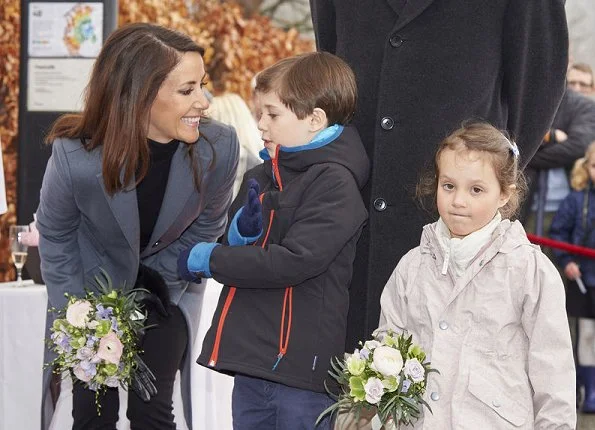 Prince Joachim, Princess Marie and their children Princess Athena and Prince Henrik attend opening of the Bakken amusement park in Klampenborg. Princess Marie wore Ralph Lauren wool coat